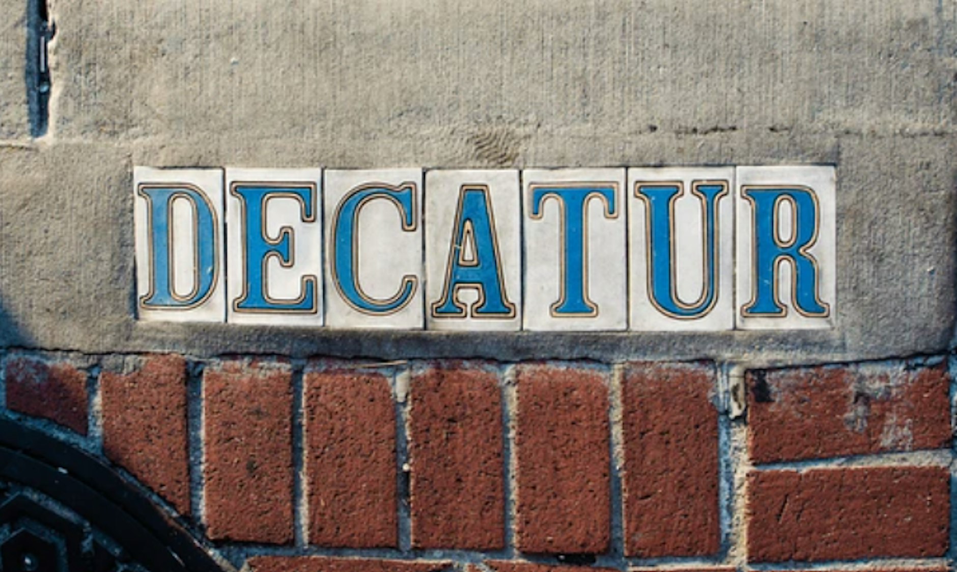 Decatur lettering on a brick building